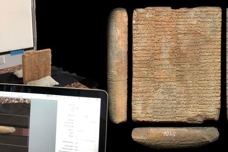 Danimarka Ulusal Müzesi çivi yazısı koleksiyonundan kil tabletleri inceleyen araştırmacılar.